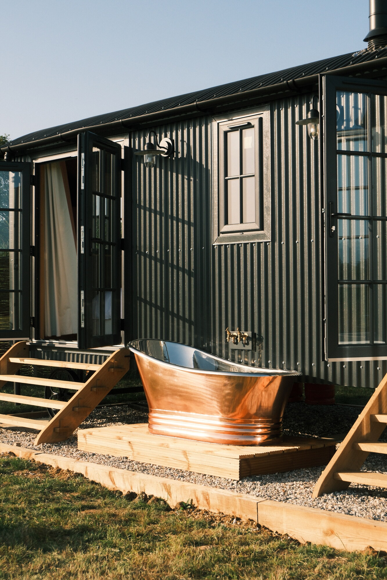 Copper roll-top bath on the hut deck