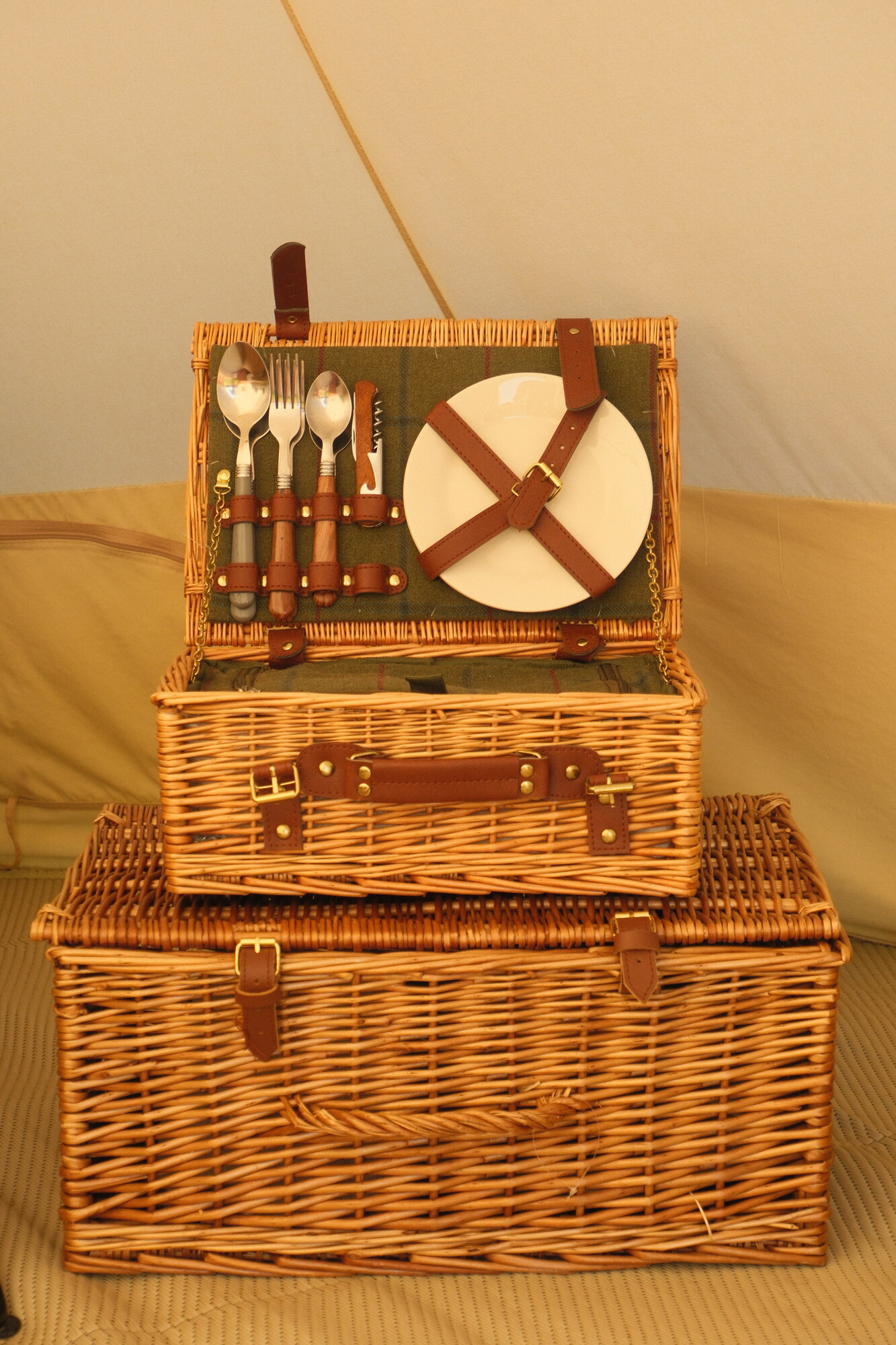 Fortnum & Mason picnic hamper inside a bell tent