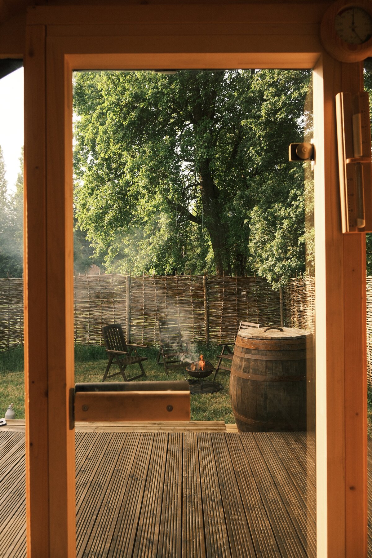 View from the sauna to the fire pit